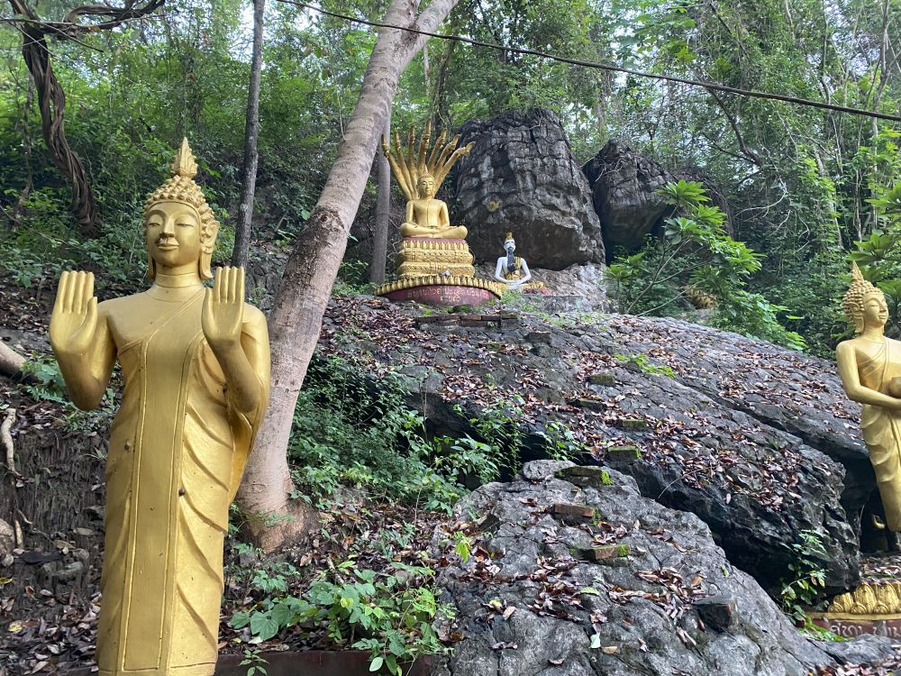 Things to do in Luang Prabang: see the Phousi Hill Buddha statues.