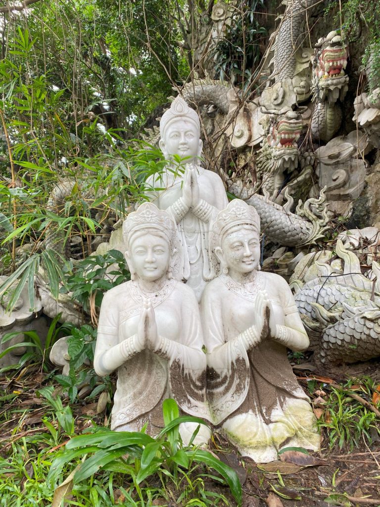 A praying statue at Marble Mountain statues in Da Nang, Vietnam.