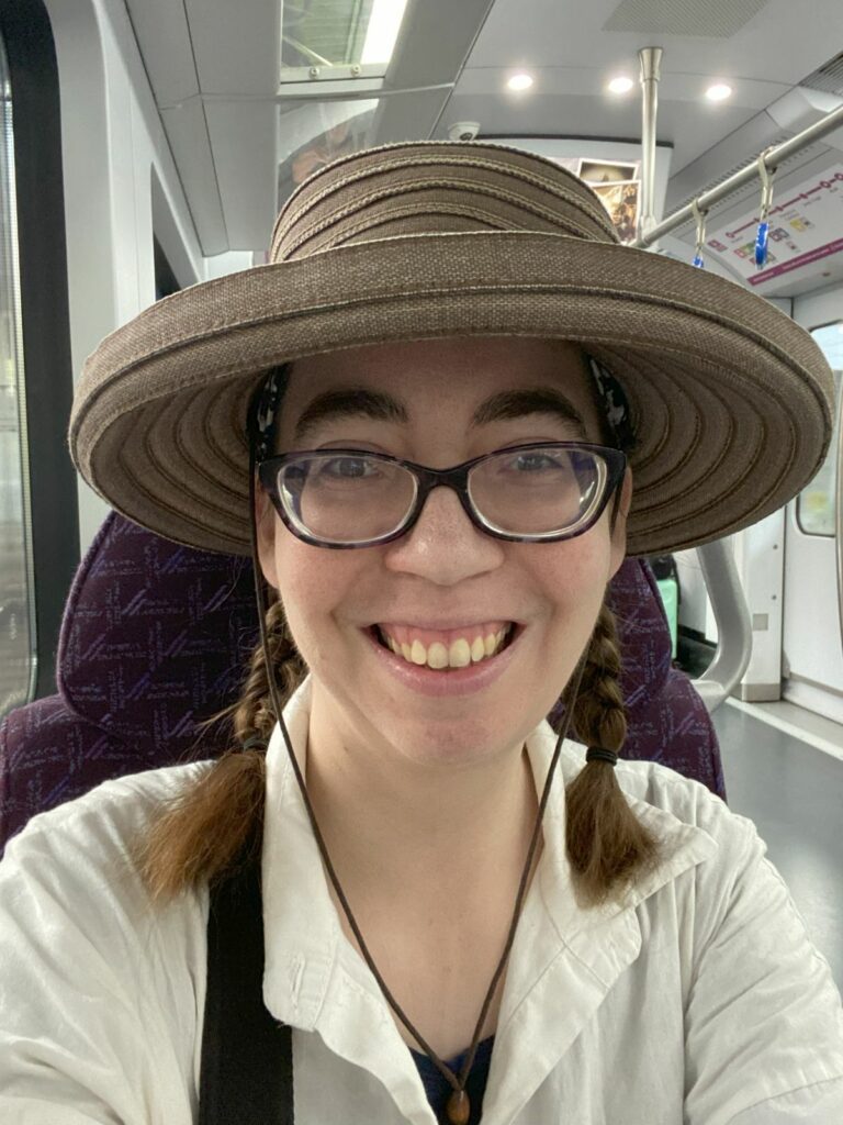 Woman in sunhat smiling