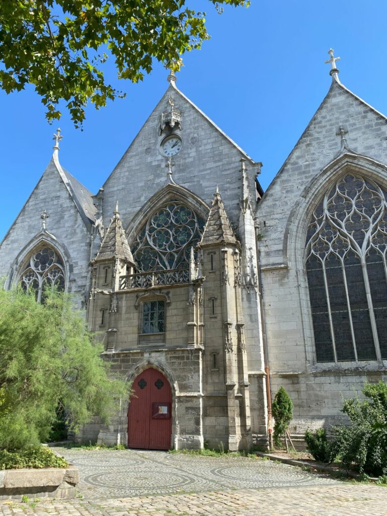 The historic Église Saint-Vivien de Rouen, featuring its tower and gothic architecture.