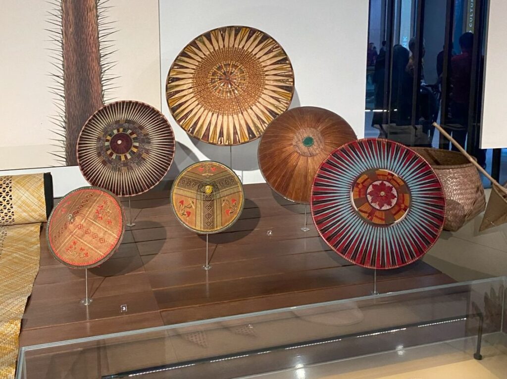 Six woven baskets, all with bright patterns and designs.