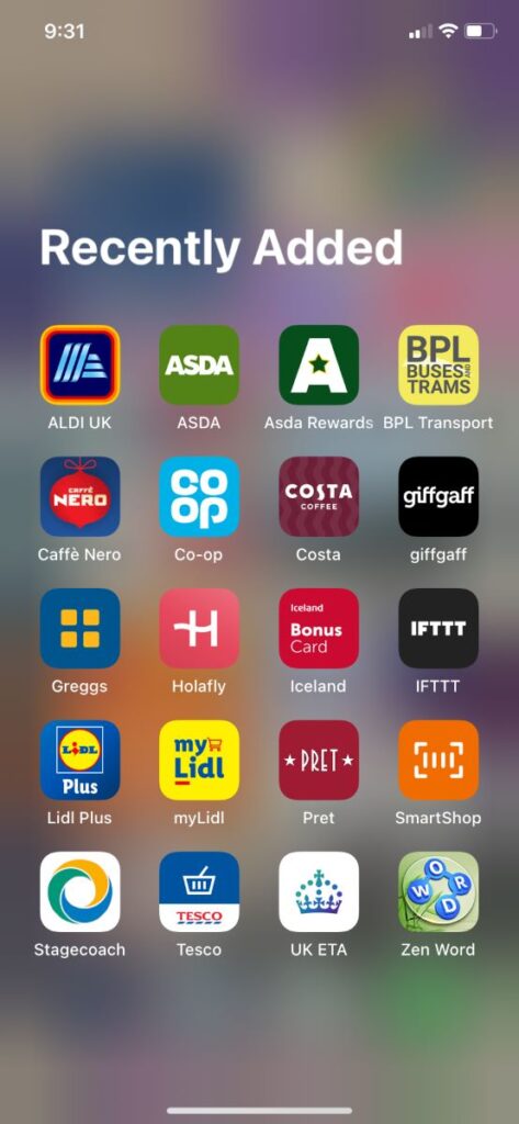 Screenshot of the Recently Added iOS folder with a dozen UK-only apps, including Costa Coffee, Co-op, Caffe Nero, Aldi US, ASDA, Greggs and Iceland.